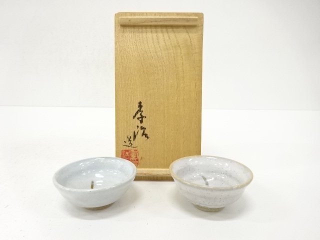 A pair of drinking cups by Koji Kudo
